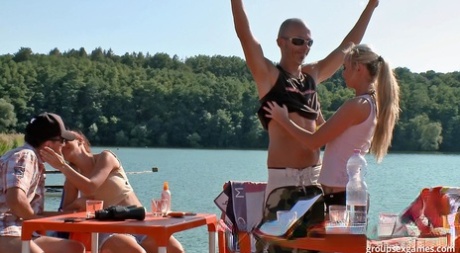 Bisexual chicks eat out pussies during a 69 on a lakeside dock 64026769