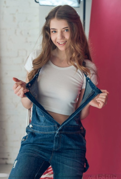 Cute teen Kay J drops her overalls and strips naked to show close up pussy 26507002