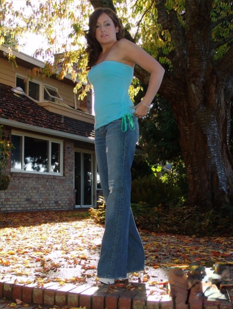 Redheaded SFW model Kylies Secret goes topless outdoors in blue jeans 76407159