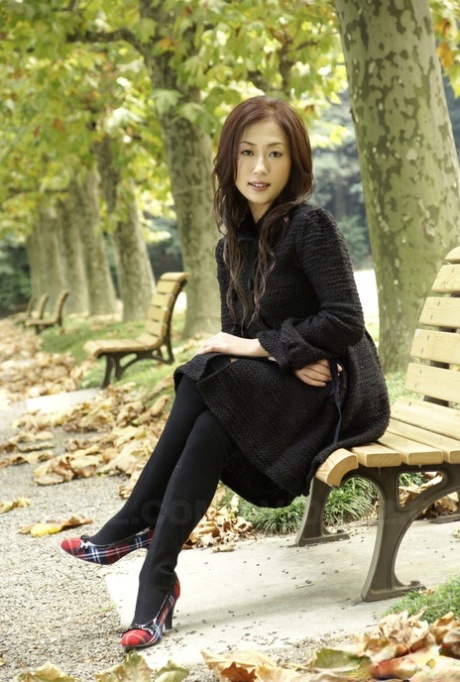 Fully clothed Japanese teen models in the park in black clothes and stockings 69438495