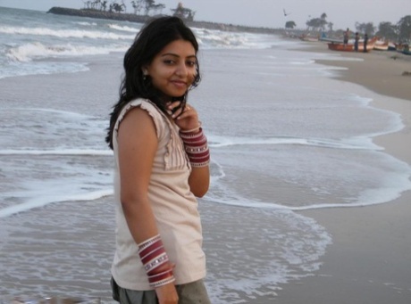 Pretty Indian girl goes barefooted at the beach during non-nude action 51399334