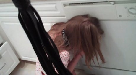 Caucasian girl Natalia sports a ball gag while pissing in her pants 20701936