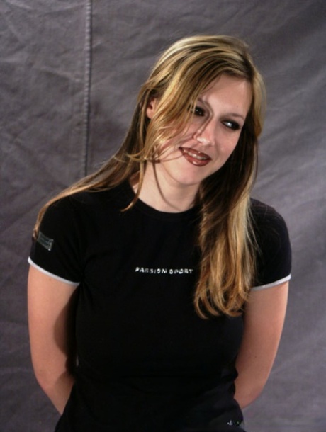 Restrained blonde girl is forced into having to smoke a cigarette 91700701