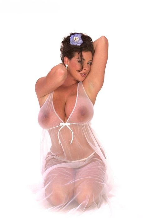 Buxom Linsey Dawn poses to flaunt her droopy tatas in sheer lingerie 25545249