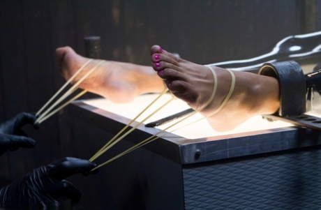 Restrained black girl screams out loud while being tortured by a sadist 85065633