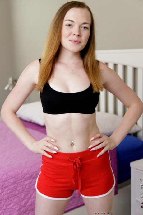 Natural redhead Samantha Reigns spreads her pale legs while showing her vagina 87465966