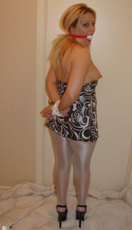 Amateur woman Adrienna shows her tits and slit while ball gagged 27341614