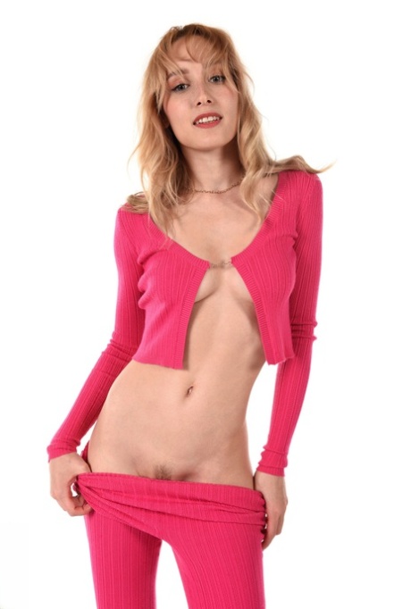Sexy MILF Kelly Collins does away with pink clothing before toying her pussy 76075838