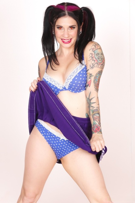 Tattooed cheerleader Joanna Angel yanks on her pigtails after getting naked 40113839