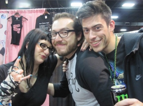 Tattooed females from Burning Angel get naughty at an XXX trade show 46377358