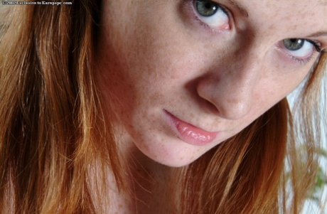 Awesome redhead girl with big boobs Allison undressing that pink pussy 64621945