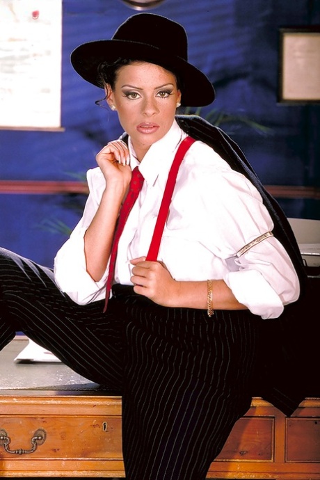 Sexy P.I. Linsey Dawn McKenzie gets on the table to denude her juggs 75469130