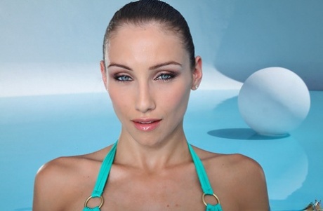 Lovely girl in glasses and bikini Celeste Star enjoys swimming in pool 92515163